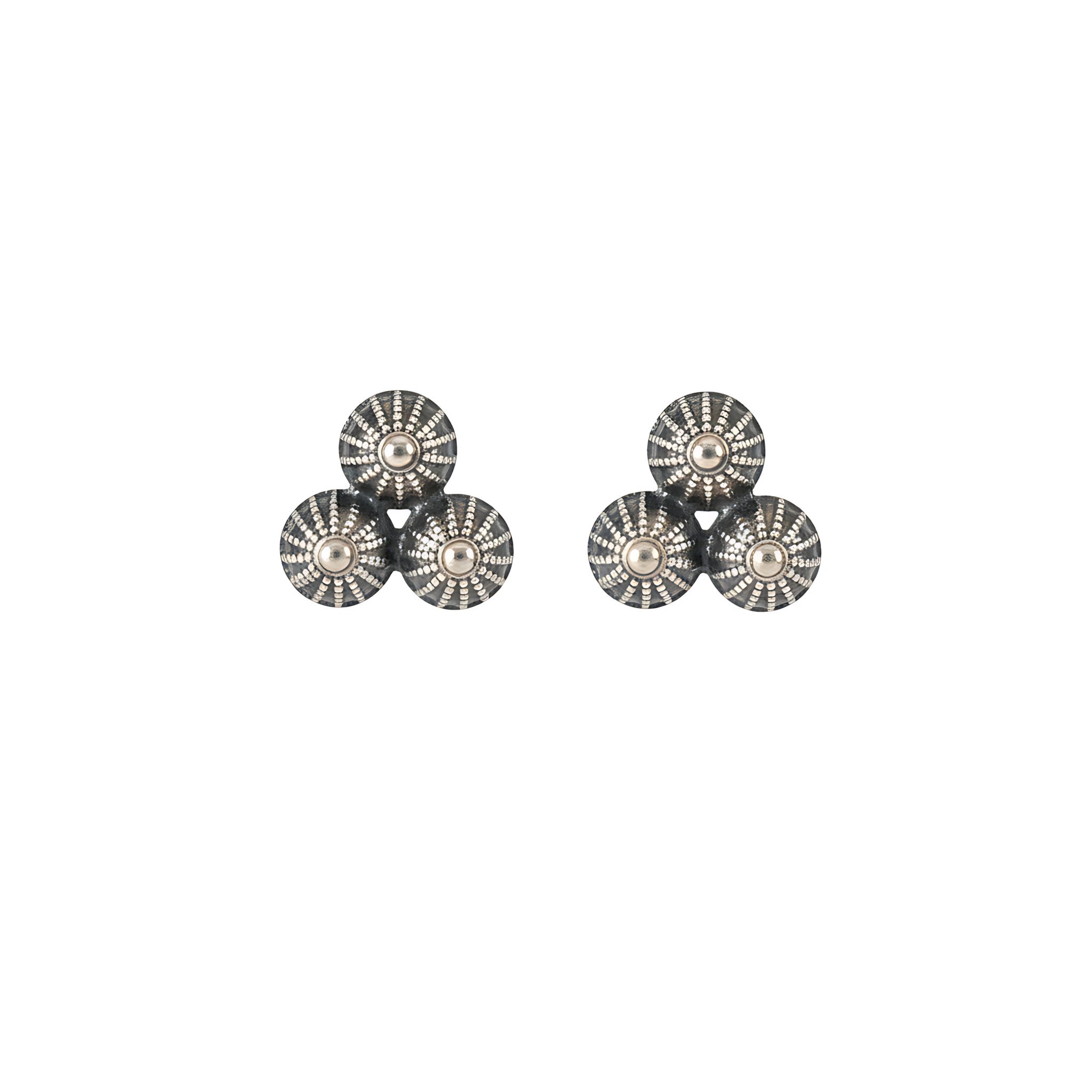 Pair of oxidized silver earrings with black and silver design shaped like 3 domes on a white background