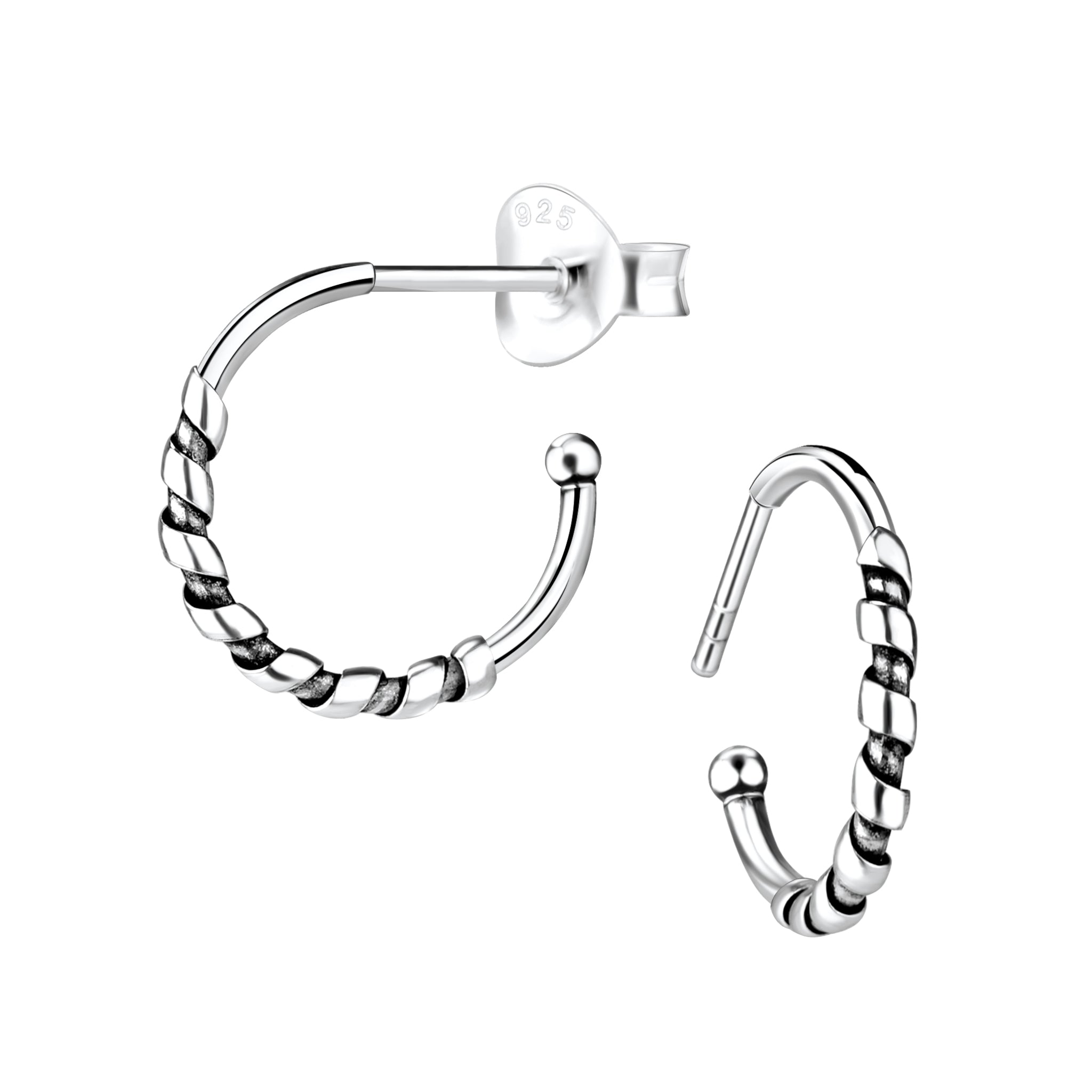 Pair of silver Bali half hoop stud earrings on a white background