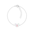 Silver bracelet with a butterfly charm on a white background
