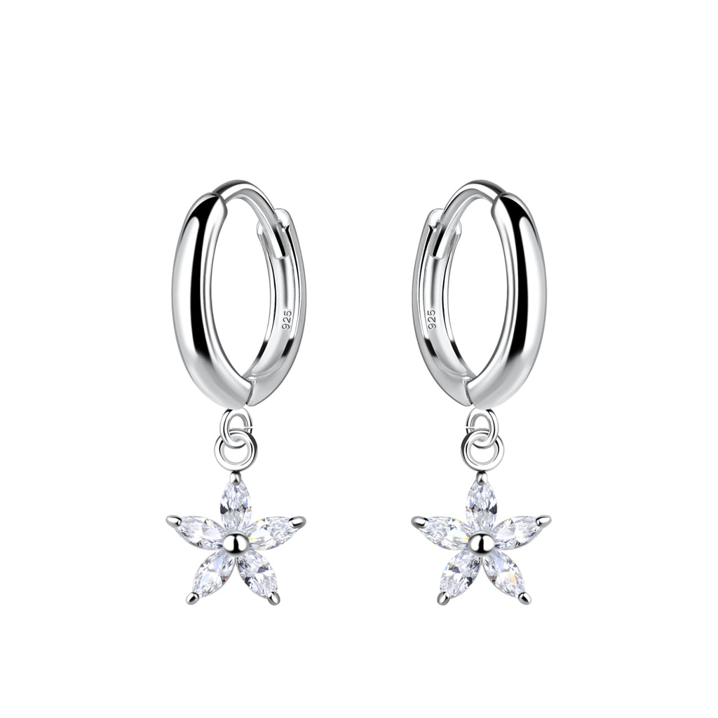 Silver hoop earrings with star-shaped charm with CZ stones on a white background