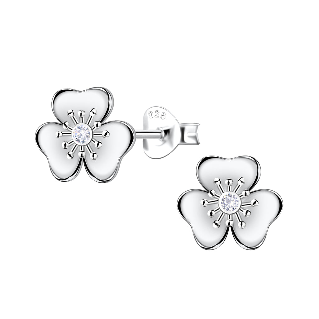 Silver clover stud earrings with CZ stones on a white background