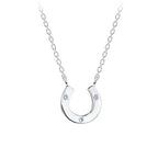 Silver horseshoe necklace with small CZ stones on a white background