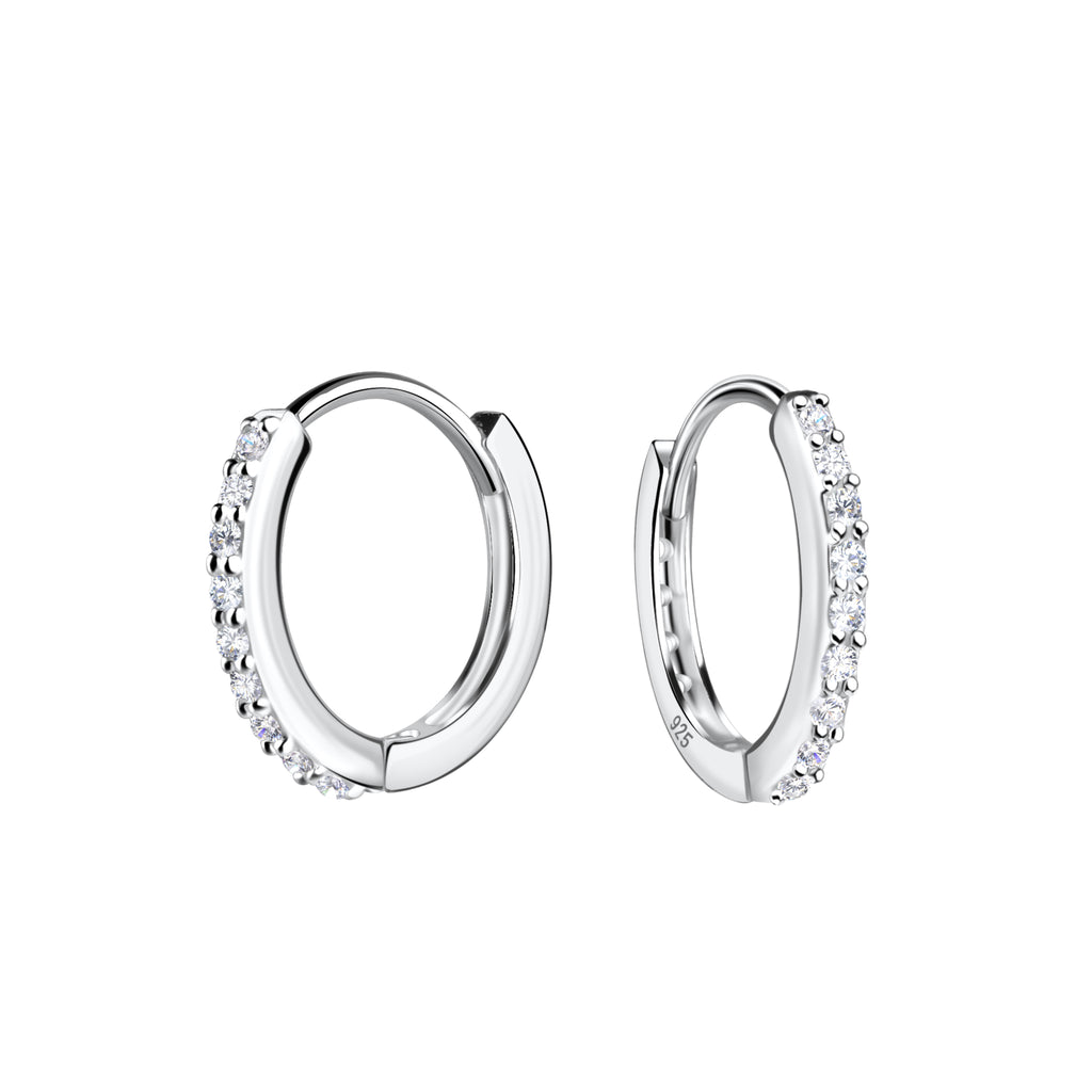 Pair of silver hoop earrings with CZ stones on a white background