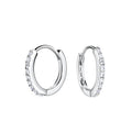 Pair of silver hoop earrings with CZ stones on a white background