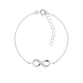 Silver infinity bracelet with CZ stones on a white background