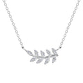 Silver necklace with olive leaf pendant with CZ stones on a white background
