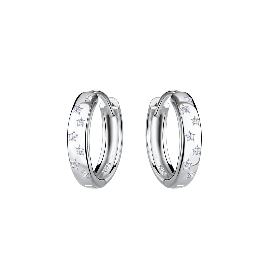 Pair of silver hoop earrings with star shaped CZ stones on a white background