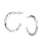 Twisted silver half hoop stud earrings on a white background