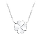 Silver four-leaf clover necklace on a white background