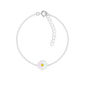 Silver bracelet with a daisy charm on a white background