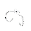 Silver diamond cut half hoop stud earrings on a white background