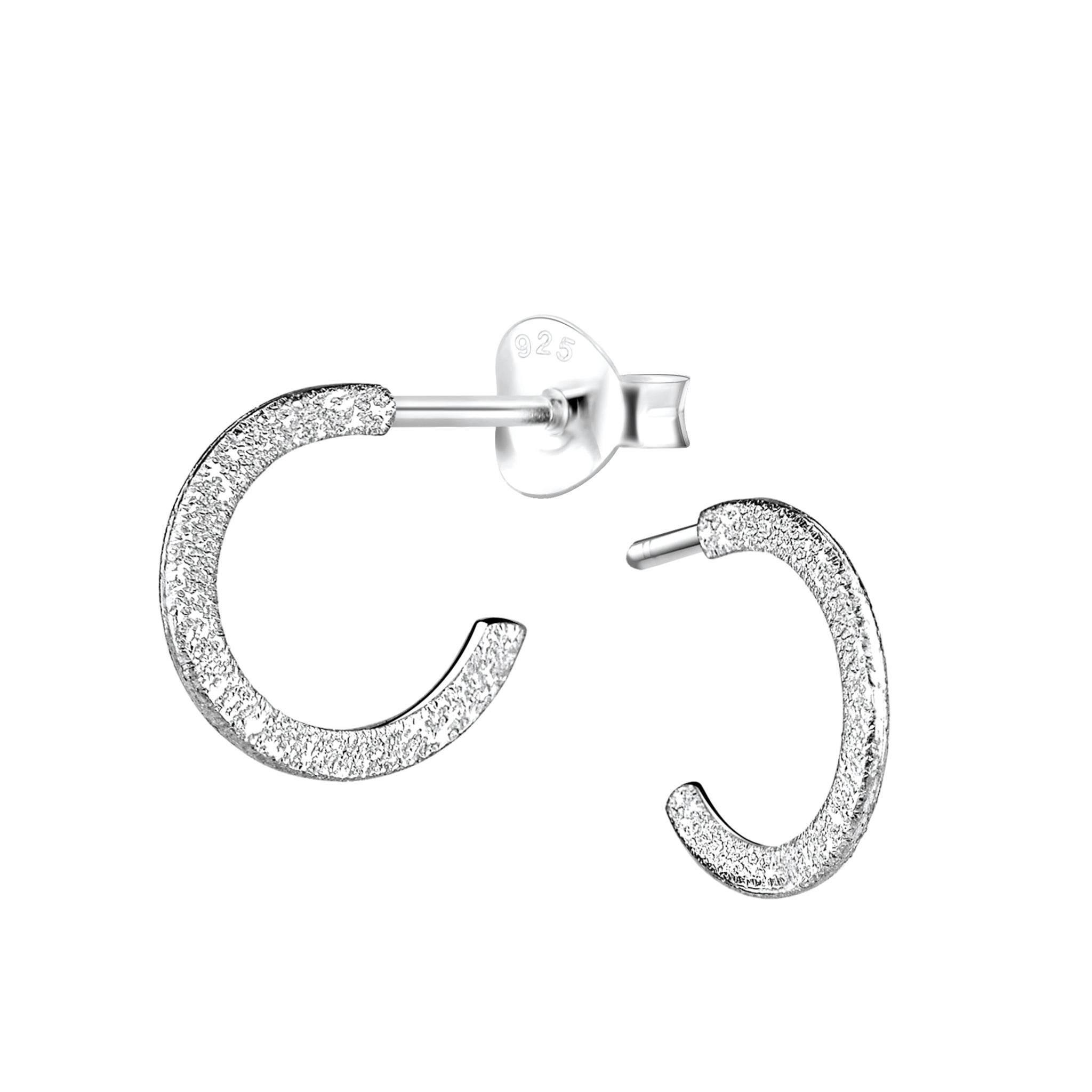Silver diamond dusted half hoop stud earrings on a white background