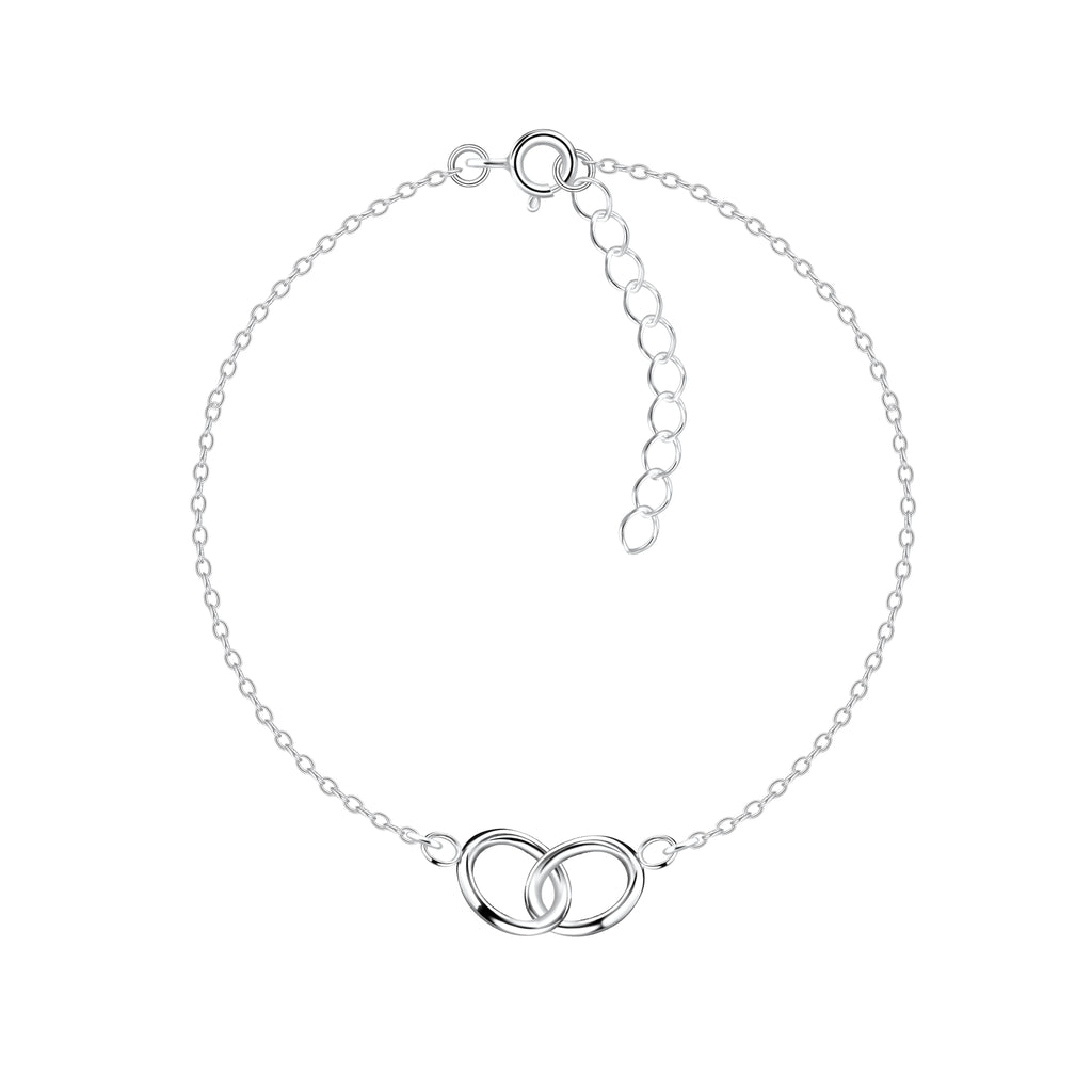 Silver bracelet with interlocking circles charms on a white background