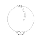 Silver bracelet with interlocking circles charms on a white background