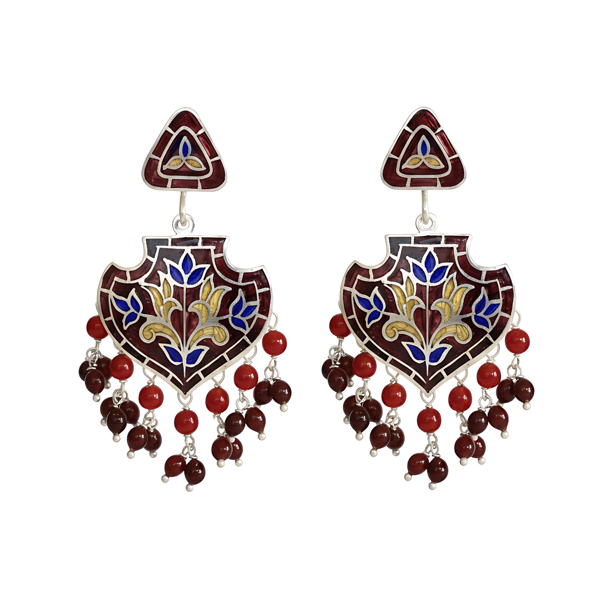 Pair of decorative enamel silver earrings with intricate designs in red, gold and blue colours on a white background