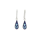 Droplet-shaped silver enamel earrings with blue floral design on a white background