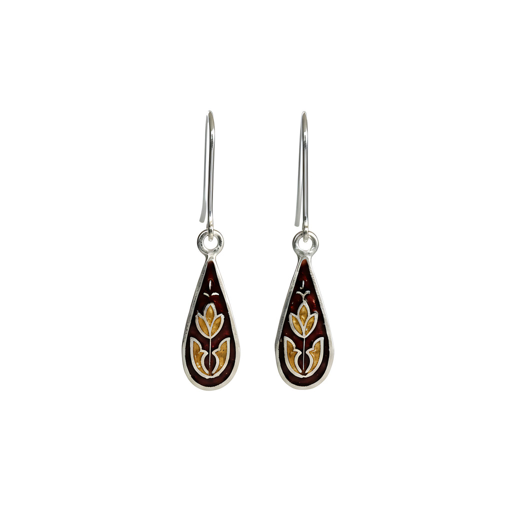 Droplet-shaped enamel silver earrings with floral design on a white background