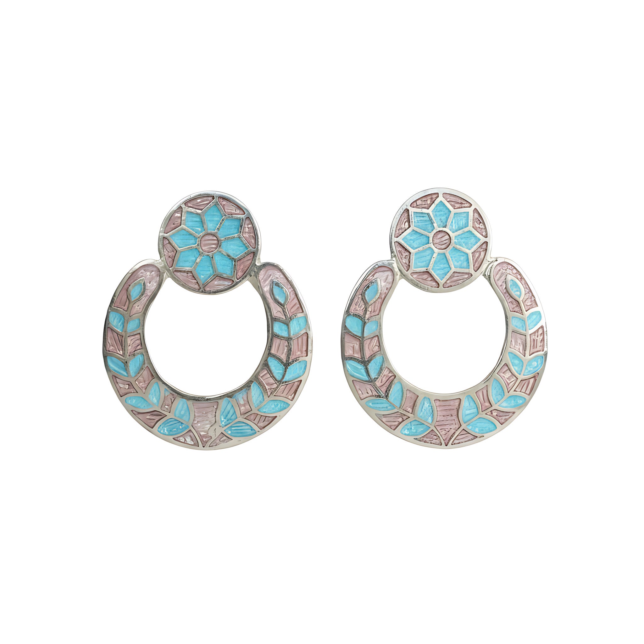 Pair of silver enamel earrings with floral design on a white background