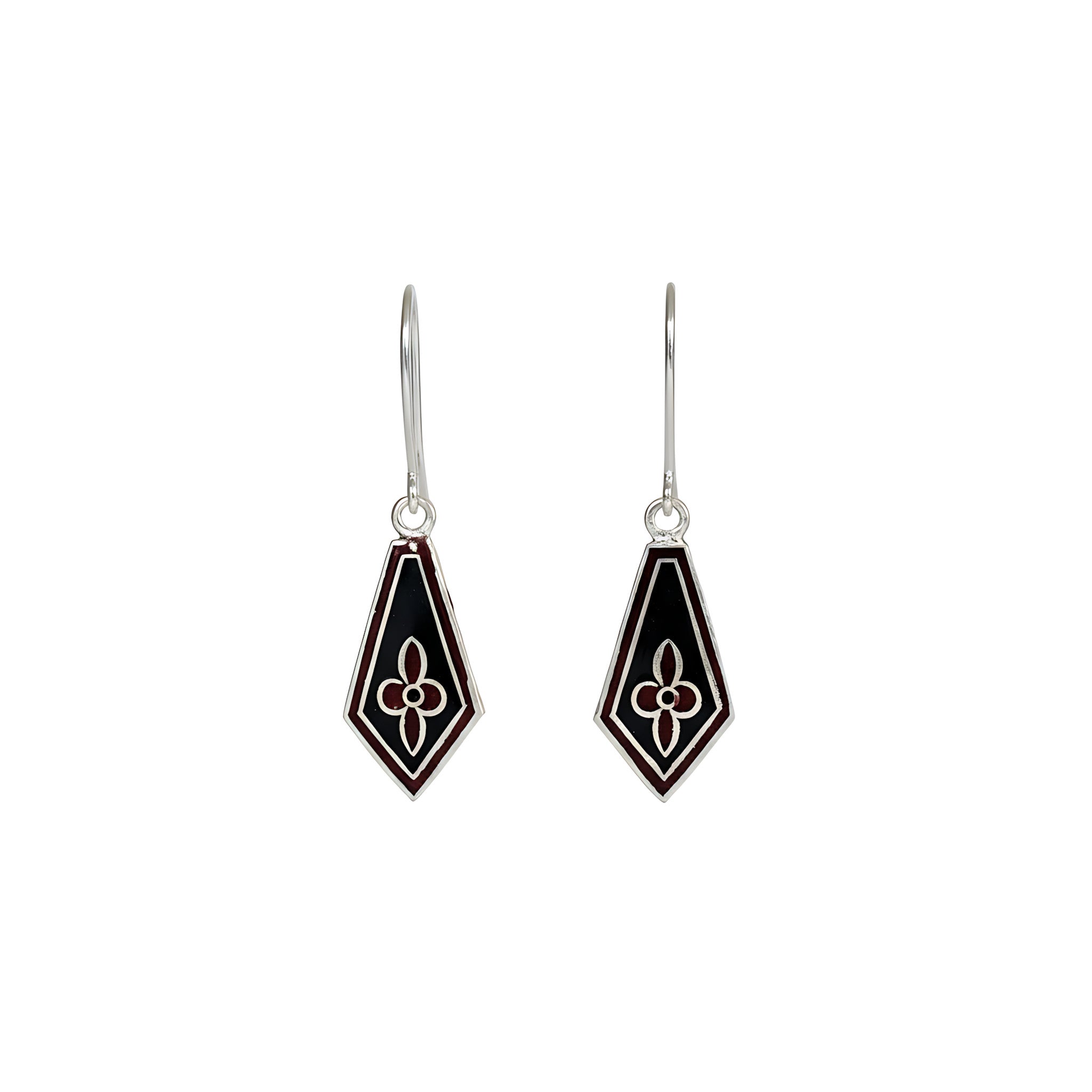 Pair of black and silver kite-shaped silver enamel earrings on a white background