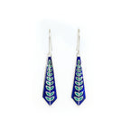 Pair of blue-green enamel silver earrings on a white background
