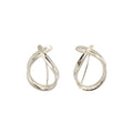 Pair of modern shiny silver dangle earrings on a white background