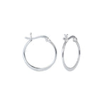 Flattened silver French lock hoop earrings on a white background