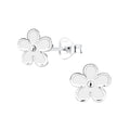 Silver flower-shaped stud earrings on a white background