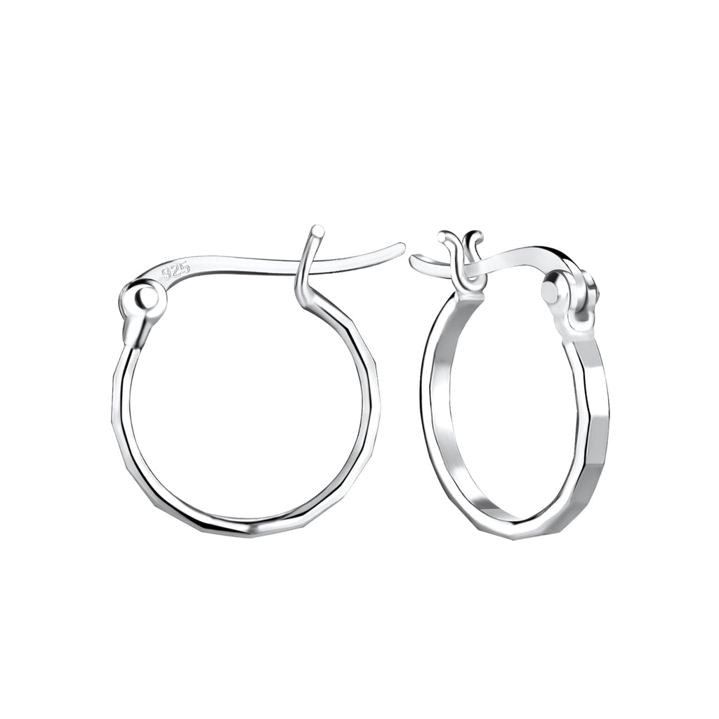 Hammered silver French lock hoop earrings on a white background