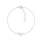 Silver bracelet with a heartbeat shaped charm on a white background
