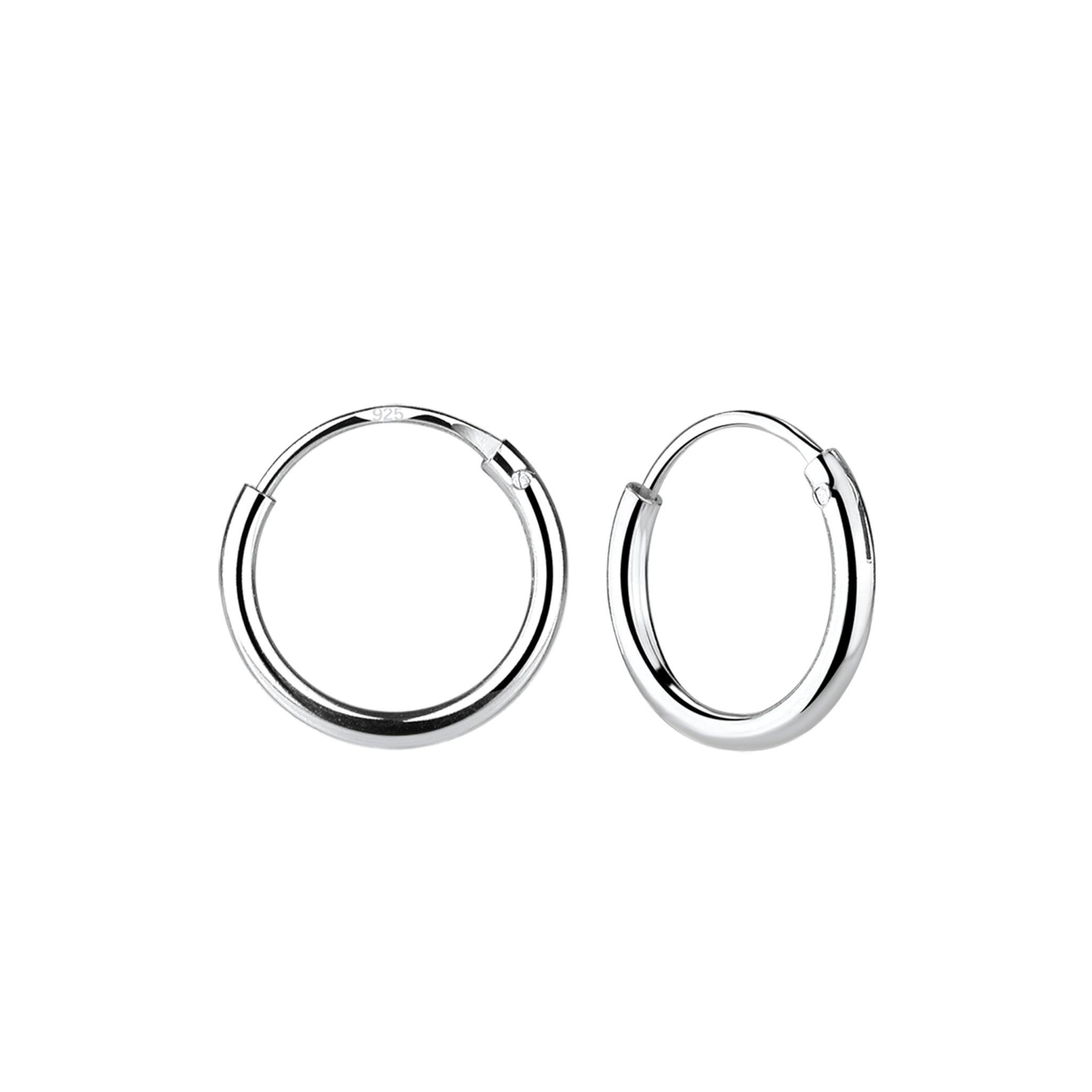 Pair of silver hoop earrings on a white background
