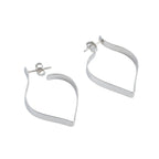 Silver petal shaped stud earrings on a white background