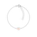 Silver bracelet with a pink heart-shaped charm on a white background