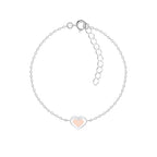 Silver bracelet with a pink heart-shaped charm on a white background