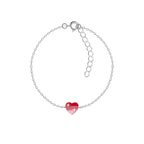Silver bracelet with a red heart-shaped charm on a white background