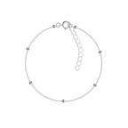 Silver satellite bracelet with small beads on a white background
