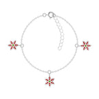 Silver bracelet with snowflake charms on a white background