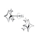 Silver triple star-shaped stud earrings on a white background