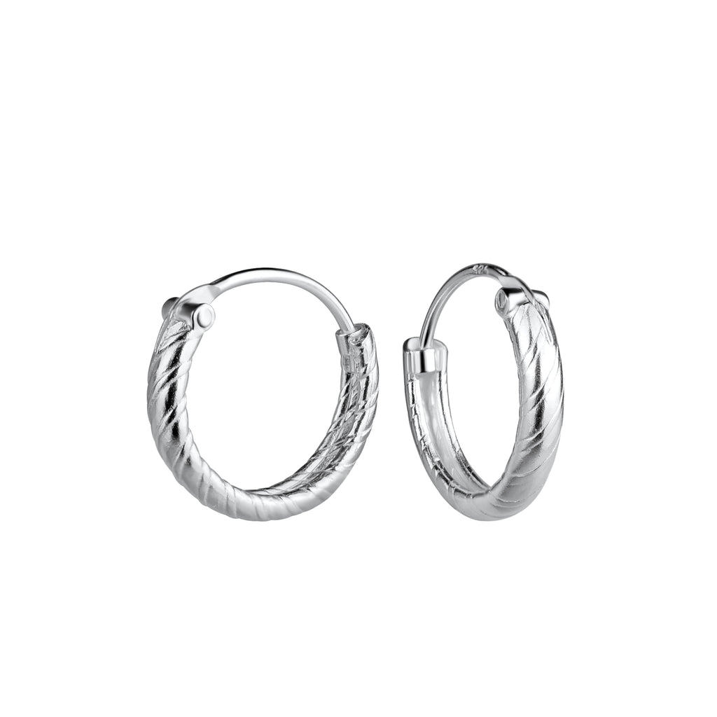 Pair of silver hoop earrings with twisted textured look on a white background