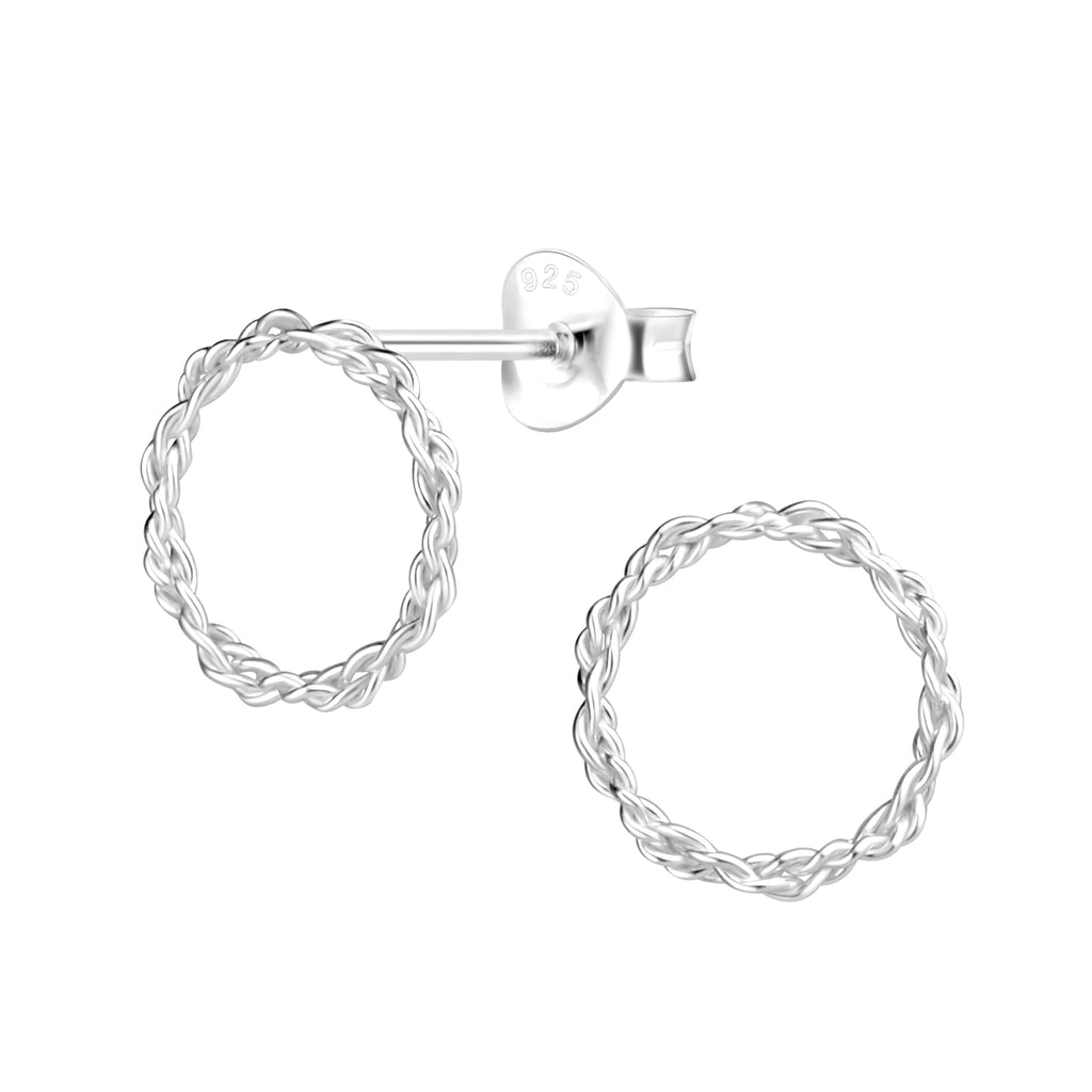 Pair of silver stud earrings in twisted circle shape on a white background