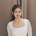 A beautiful female showcasing everyday silver earrings.